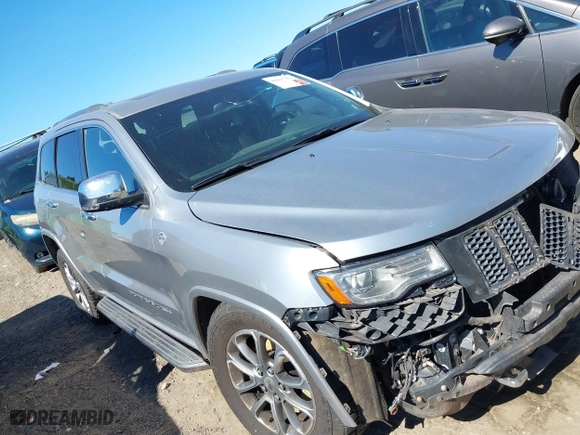 2014 Jeep Grand Cherokee Overland with VIN 1C4RJFCM4EC316142, listed as a IAAI auction lot 40607061 with 195,008 mi miles. Bid and sale history available at carsss.com. Image 1.