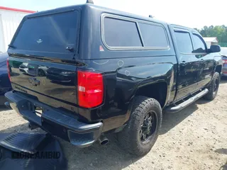 2015 Chevrolet Silverado 1500 LT with VIN 3GCUKREC5FG515521, listed as a IAAI auction lot 42116115 with 146,615 mi miles and . Bid and sale history available at DreamBid. Image 4.