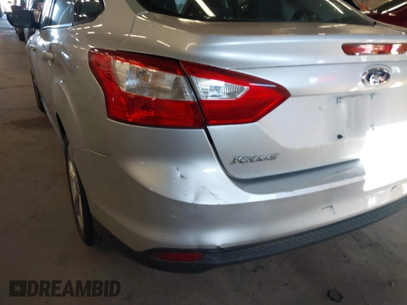 2013 Ford Focus SE z VIN 1FADP3F24DL277767, wystawiony jako IAAI lot #41562390 z przebiegiem 183 322 mil mil oraz . Historia ofert i sprzedaży dostępna na DreamBid. Obrazek 15.