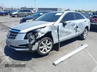 2016 Cadillac ATS Standard RWD with VIN 1G6AA5RAXG0113610, listed as a IAAI auction lot 42002672 with 90,145 mi miles and . Bid and sale history available at DreamBid. Image 2.