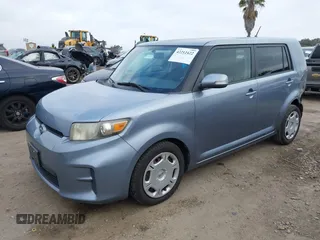 2012 Scion xB with VIN JTLZE4FE7C1144036, listed as a IAAI auction lot 42212422 with 180,692 mi miles and . Bid and sale history available at DreamBid. Image 2.