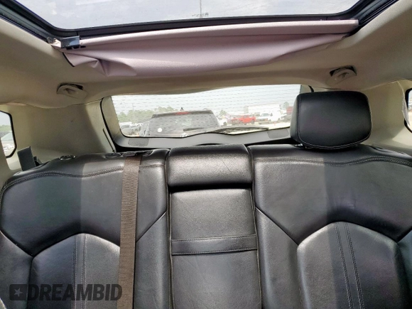 2012 Cadillac SRX Premium Collection z VIN 3GYFNCE39CS526425, wystawiony jako Copart lot #60557615 z przebiegiem 161 217 mil mil oraz Szkoda całkowita • Salvage title. Historia ofert i sprzedaży dostępna na DreamBid. Obrazek 10.