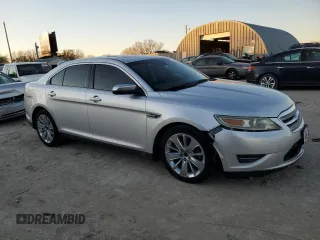 2012 Ford Taurus Limited with VIN 1FAHP2JW8CG143714, listed as a Copart auction lot 81617054 with 167,799 mi miles and Salvage title. Bid and sale history available at DreamBid. Image 4.