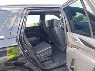 2023 Cadillac Escalade 4WD Sport z VIN 1GYS4EKLXPR513435, wystawiony jako IAAI lot #42137452 z przebiegiem 27 495 mil mil oraz . Historia ofert i sprzedaży dostępna na DreamBid. Obrazek 8.