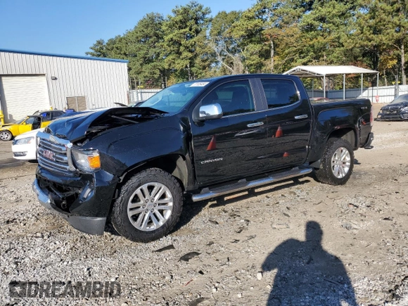 2018 GMC Canyon 4WD SLT with VIN 1GTG6DEN4J1296628, listed as a Copart auction lot 77135484 with 74,486 mi miles and Salvage Title. Bid and sale history available at carsss.com. Image 1.