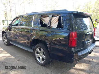 2015 Chevrolet Suburban LT with VIN 1GNSCJKC1FR264255, listed as a IAAI auction lot 42065176 with 115,861 mi miles. Bid and sale history available at carsss.com. Image 3.