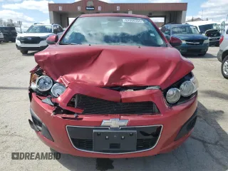 2012 Chevrolet Sonic LT z VIN 1G1JD5SB1C4160396, wystawiony jako Copart lot #52098365 z przebiegiem 125 733 mil mil oraz Szkoda całkowita • Salvage title. Historia ofert i sprzedaży dostępna na DreamBid. Obrazek 5.