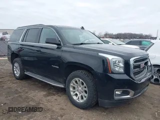 2016 GMC Yukon SLE with VIN 1GKS2AKC2GR357481, listed as a IAAI auction lot 41715909 with 165,377 mi miles. Bid and sale history available at carsss.com. Image 1.