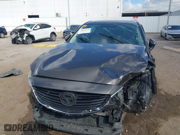 2016 Mazda Mazda6 i Sport with VIN JM1GJ1U56G1422012, listed as a IAAI auction lot 40693636 with 93,094 mi miles. Bid and sale history available at carsss.com. Image 12.