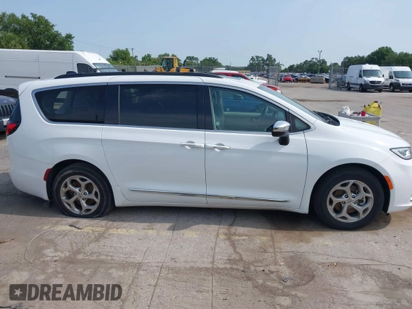 2023 Chrysler Pacifica Limited with VIN 2C4RC1GG7PR566163, listed as a IAAI auction lot 42393988 with 59,354 mi miles and . Bid and sale history available at DreamBid. Image 13.