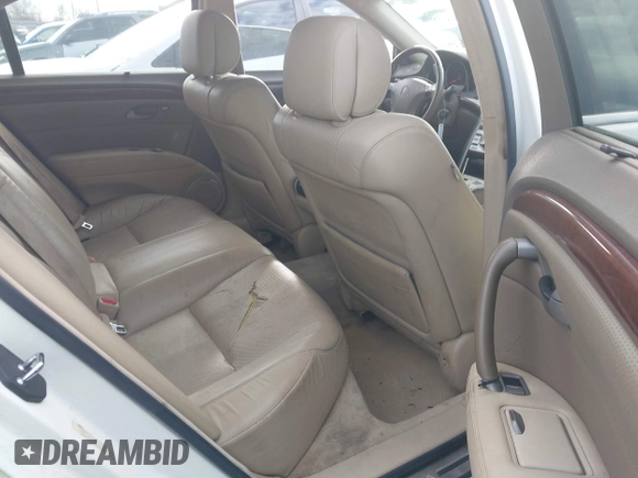 2006 Acura RL z VIN JH4KB16546C002058, wystawiony jako IAAI lot #41286711 z przebiegiem 297 234 mil mil oraz . Historia ofert i sprzedaży dostępna na DreamBid. Obrazek 8.