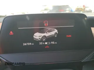 2021 Volkswagen ID.4 Pro S z VIN WVGKMPE22MP046499, wystawiony jako Copart lot #57947235 z przebiegiem 26 759 mil mil oraz Nie do naprawy • Non repairable. Historia ofert i sprzedaży dostępna na DreamBid. Obrazek 9.