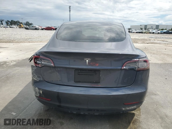 2023 Tesla Model 3 с VIN 5YJ3E1EA7PF449077, выставлен на аукционе Copart как лот 56821975 с пробегом 42 037 миль миль и Списание • Salvage title. История ставок и продаж доступна на DreamBid. Изображение 6.