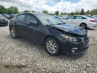 2015 Mazda 3 i Touring with VIN 3MZBM1L76FM208057, listed as a Copart auction lot 56818335 with 112,457 mi miles and Salvage title. Bid and sale history available at DreamBid. Image 4.