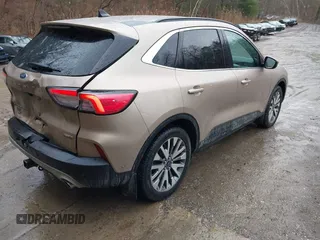 2021 Ford Escape Titanium Hybrid with VIN 1FMCU9DZXMUA66161, listed as a IAAI auction lot 41208651 with 61,198 mi miles and . Bid and sale history available at DreamBid. Image 4.