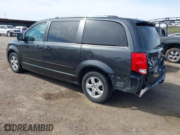 2011 Dodge Grand Caravan Crew with VIN 2D4RN5DG3BR660235, listed as a IAAI auction lot 41945522 with 148,924 mi miles and . Bid and sale history available at DreamBid. Image 3.