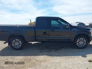 2018 Ford F-150 XL with VIN 1FTEX1EP7JFC21008, listed as a IAAI auction lot 42072145 with 102,679 mi miles and . Bid and sale history available at DreamBid. Image 13.