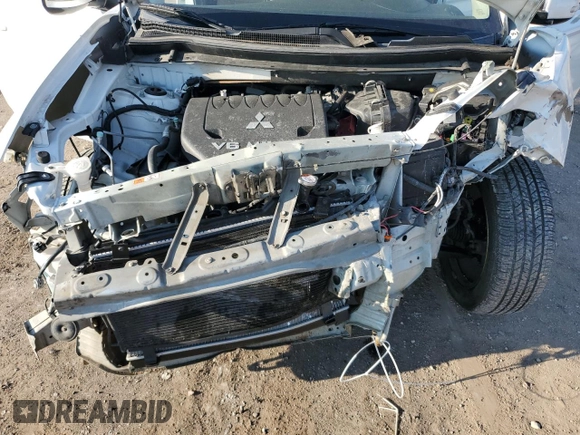 2014 Mitsubishi Outlander GT z VIN JA4JZ4AXXEZ010822, wystawiony jako Copart lot #60328445 z przebiegiem Nie podano mil oraz Szkoda całkowita • Salvage title. Historia ofert i sprzedaży dostępna na DreamBid. Obrazek 12.