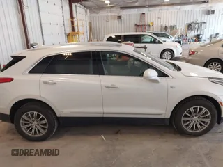 2018 Cadillac XT5 Luxury AWD z VIN 1GYKNDRS9JZ248969, wystawiony jako IAAI lot #42463156 z przebiegiem 90 271 mil mil oraz . Historia ofert i sprzedaży dostępna na DreamBid. Obrazek 13.