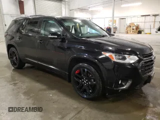 2018 Chevrolet Traverse Premier with VIN 1GNEVJKWXJJ119546, listed as a Copart auction lot 52326795 with 111,836 mi miles and Salvage Title. Bid and sale history available at carsss.com. Image 4.