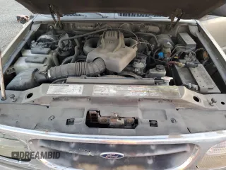 1999 Ford Explorer XLT z VIN 1FMZU32E0XZB31890, wystawiony jako Copart lot #84967184 z przebiegiem 220 424 mil mil oraz Szkoda całkowita • Salvage title. Historia ofert i sprzedaży dostępna na DreamBid. Obrazek 12.