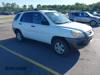 2006 Kia Sportage LX z VIN KNDJF723067169115, wystawiony jako IAAI lot #42315047 z przebiegiem 199 128 mil mil oraz . Historia ofert i sprzedaży dostępna na DreamBid. Obrazek 1.