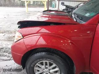 2015 Nissan Frontier SV with VIN 1N6AD0ER7FN711493, listed as a IAAI auction lot 41761772 with 265,000 mi miles. Bid and sale history available at carsss.com. Image 6.