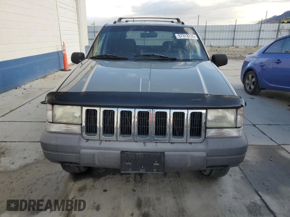 1996 Jeep Grand Cherokee Laredo with VIN 1J4GZ58S3TC245928, listed as a Copart auction lot 57313735 with 165,733 mi miles and Salvage title. Bid and sale history available at DreamBid. Image 5.
