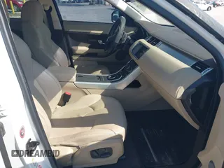 2015 Land Rover Range Rover Evoque Pure Premium z VIN SALVR2BG0FH964683, wystawiony jako IAAI lot #42016766 z przebiegiem 94 942 mil mil oraz . Historia ofert i sprzedaży dostępna na DreamBid. Obrazek 5.