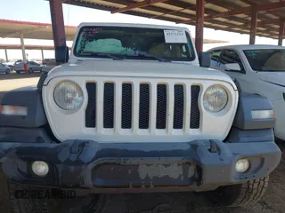 2020 Jeep Wrangler Unlimited Sport S z VIN 1C4HJXDG3LW188241, wystawiony jako IAAI lot #42371324 z przebiegiem 86 216 mil mil oraz . Historia ofert i sprzedaży dostępna na DreamBid. Obrazek 13.