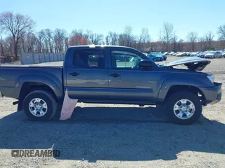 2015 Toyota Tacoma with VIN 3TMLU4EN0FM194841, listed as a IAAI auction lot 41860349 with 200,005 mi miles and . Bid and sale history available at DreamBid. Image 14.