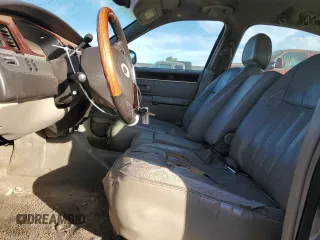 2003 Lincoln Town Car Signature z VIN 1LNHM82W73Y612608, wystawiony jako Copart lot #88304985 z przebiegiem Nie podano mil oraz Nie do naprawy • Non repairable. Historia ofert i sprzedaży dostępna na DreamBid. Obrazek 7.
