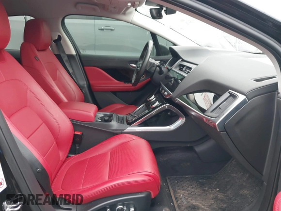 2020 Jaguar I-Pace SE with VIN SADHC2S14L1F80256, listed as a IAAI auction lot 42055674 with 48,694 mi miles and . Bid and sale history available at DreamBid. Image 5.