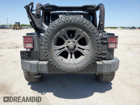 2015 Jeep Wrangler Sport with VIN 1C4GJWAG8FL563198, listed as a Copart auction lot 52867385 with 47,854 mi miles and Salvage title. Bid and sale history available at DreamBid. Image 6.