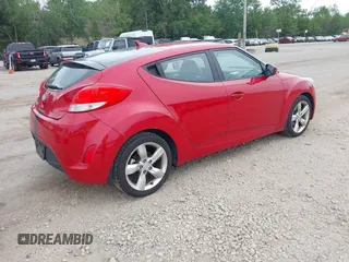 2013 Hyundai Veloster w/Gray Int with VIN KMHTC6AD0DU145090, listed as a IAAI auction lot 42618390 with 126,641 mi miles and . Bid and sale history available at DreamBid. Image 4.
