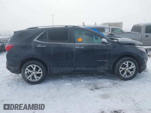 2021 Chevrolet Equinox Premier z VIN 3GNAXXEV2MS137119, wystawiony jako IAAI lot #41344057 z przebiegiem Nie podano mil oraz . Historia ofert i sprzedaży dostępna na DreamBid. Obrazek 13.