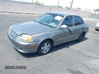 2003 Hyundai Accent GL with VIN KMHCG45C73U471607, listed as a IAAI auction lot 41956551 with 222,305 mi miles. Bid and sale history available at carsss.com. Image 2.