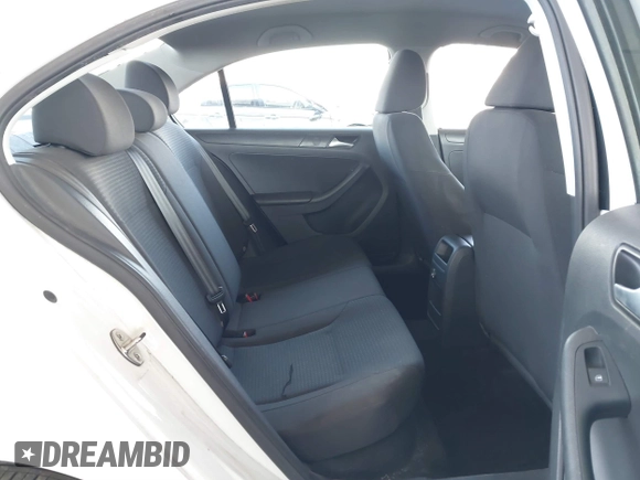 2015 Volkswagen Jetta Sedan 2.0L S with VIN 3VW2K7AJ3FM253125, listed as a IAAI auction lot 41535632 with 103,953 mi miles. Bid and sale history available at carsss.com. Image 8.