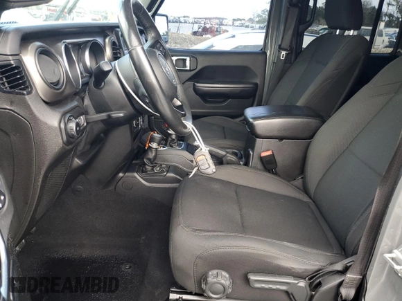 2019 Jeep Wrangler Unlimited Sport S with VIN 1C4HJXDG3KW583521, listed as a Copart auction lot 62835915 with 115,292 mi miles and Salvage title. Bid and sale history available at DreamBid. Image 7.