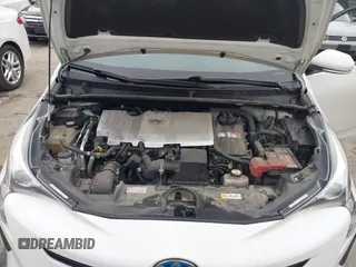 2017 Toyota Prius Two with VIN JTDKBRFUXH3036063, listed as a IAAI auction lot 42036676 with 202,873 mi miles. Bid and sale history available at carsss.com. Image 10.