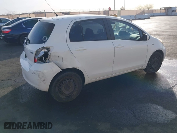 2009 Toyota Yaris with VIN JTDKT903795263620, listed as a IAAI auction lot 41100398 with 66,384 mi miles. Bid and sale history available at carsss.com. Image 4.