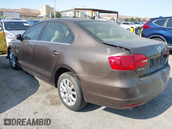 2014 Volkswagen Jetta SE with VIN 3VWD17AJ7EM385606, listed as a IAAI auction lot 42575046 with 86,889 mi miles and . Bid and sale history available at DreamBid. Image 3.
