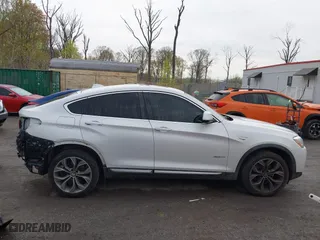 2018 BMW X4 xDrive28i with VIN 5UXXW3C57J0T82081, listed as a IAAI auction lot 41991254 with 100,654 mi miles. Bid and sale history available at carsss.com. Image 13.
