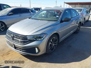 2023 Volkswagen Jetta Sport with VIN 3VWBM7BU5PM016768, listed as a IAAI auction lot 41427777 with 32,950 mi miles and . Bid and sale history available at DreamBid. Image 17.