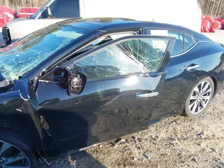 2023 Nissan Maxima Platinum z VIN 1N4AA6FV9PC513365, wystawiony jako IAAI lot #41652441 z przebiegiem 9 650 mil mil oraz . Historia ofert i sprzedaży dostępna na DreamBid. Obrazek 19.