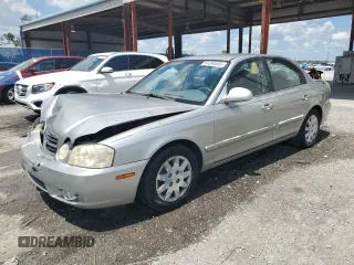 2006 Kia Optima LX z VIN KNAGD126265449022, wystawiony jako Copart lot #61248585 z przebiegiem 170 773 mil mil oraz Szkoda całkowita • Salvage title. Historia ofert i sprzedaży dostępna na DreamBid. Obrazek 1.