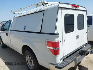 2012 Ford F-150 XL with VIN 1FTMF1CM0CKD38611, listed as a IAAI auction lot 41884475 with 117,524 mi miles. Bid and sale history available at carsss.com. Image 3.