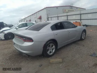 2021 Dodge Charger SXT with VIN 2C3CDXBG5MH642871, listed as a IAAI auction lot 41509420 with 100,789 mi miles. Bid and sale history available at carsss.com. Image 4.