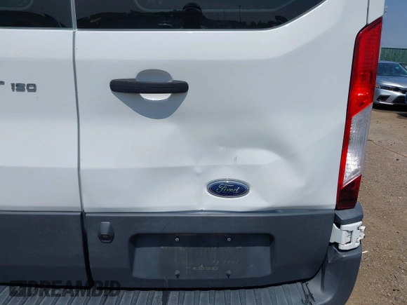 2016 Ford Transit Cargo with VIN 1FTYE1ZM1GKB27189, listed as a IAAI auction lot 40110239 with 131,106 mi miles and . Bid and sale history available at carsss.com. Image 6.