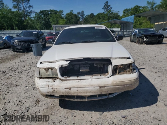 2010 Ford Police Interceptor with VIN 2FABP7BV7AX140870, listed as a Copart auction lot 53457275 with 124,194 mi miles and Salvage title. Bid and sale history available at DreamBid. Image 5.